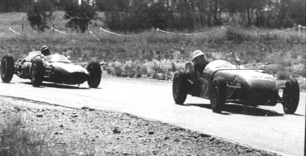 Brausch Niemann in front with a Lotus 7 with John Love with Cooper T55 at the Rear .Malcolm Kinsey �